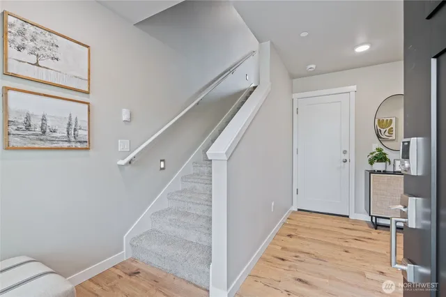 a view of entryway with wooden floor
