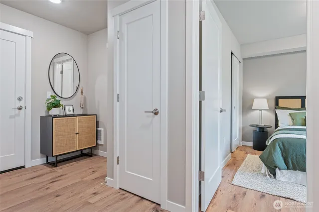 a bedroom with a bed and a dresser