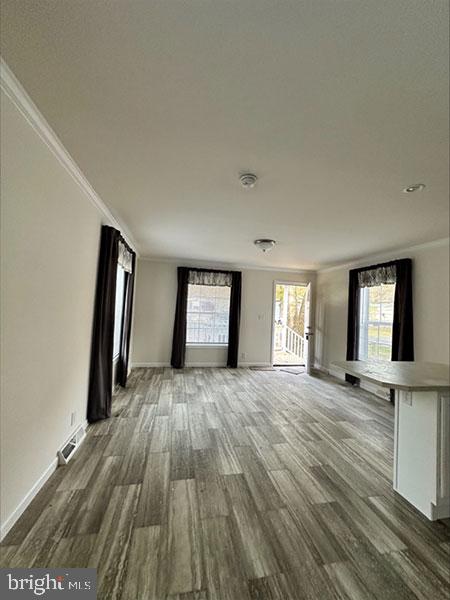 1679 South State Street, Unit A57 Dover, DE 19901 - Photo 15 of 25 a view of a room with window and wooden floor