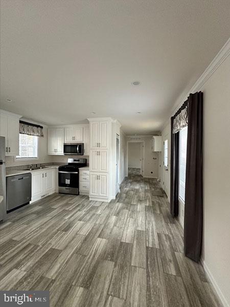 1679 South State Street, Unit A57 Dover, DE 19901 - Photo 20 of 25 a view of a kitchen with wooden floor
