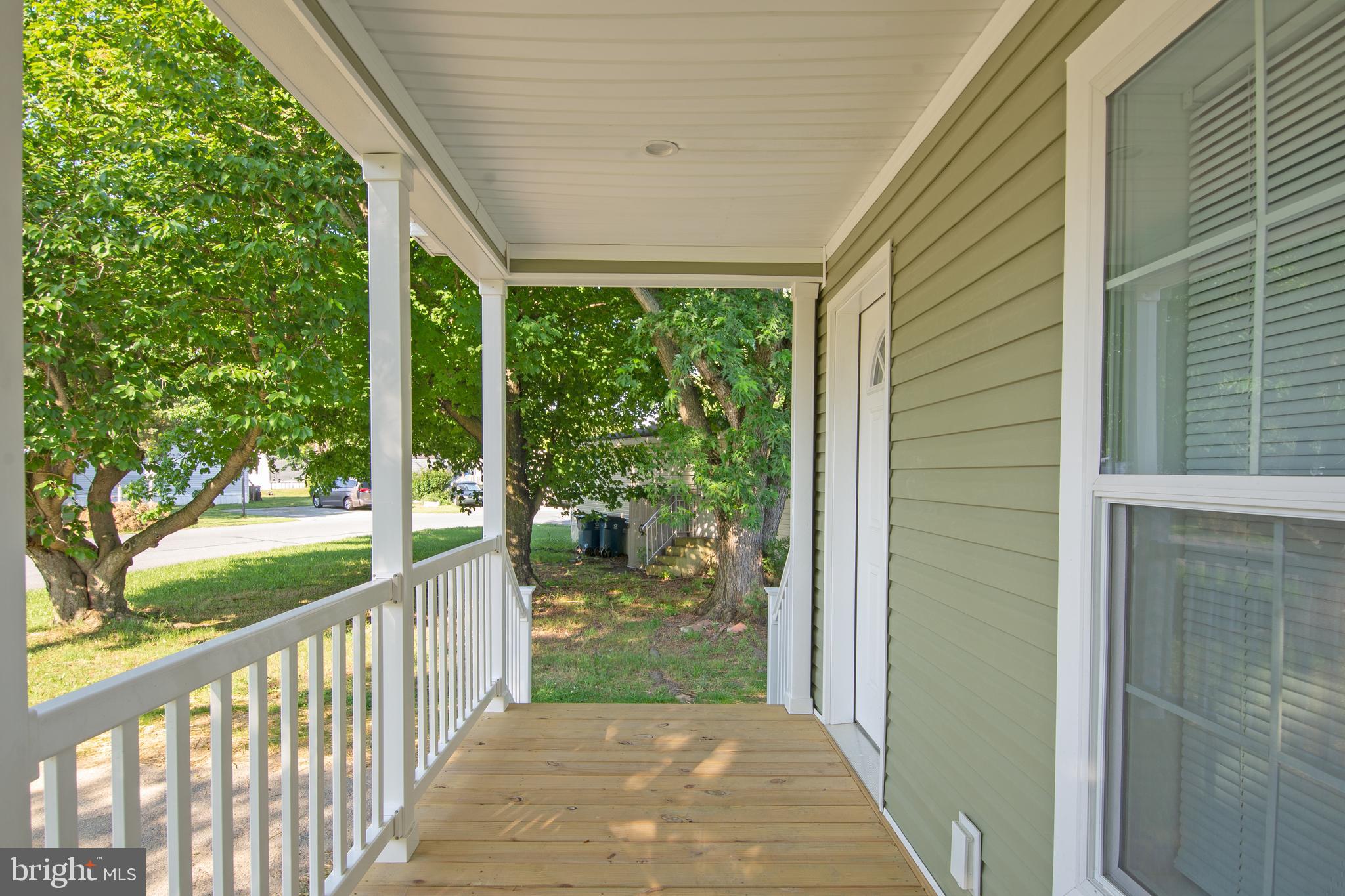 1679 South State Street, Unit A57 Dover, DE 19901 - Photo 2 of 25 a view of a porch and garden