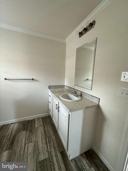 1679 South State Street, Unit A57 Dover, DE 19901 - Photo 21 of 25 a utility room with wooden floor washer and dryer