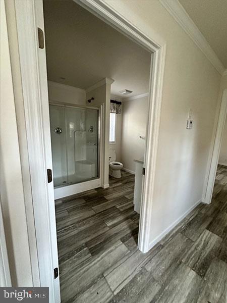 1679 South State Street, Unit A57 Dover, DE 19901 - Photo 22 of 25 a view of a hallway with wooden floor and a living room