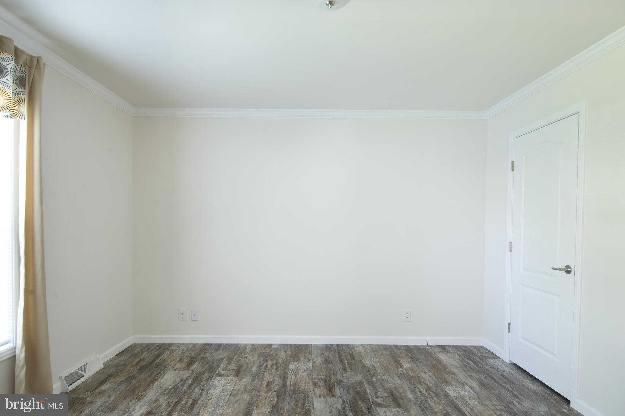 1679 South State Street, Unit A57 Dover, DE 19901 - Photo 7 of 25 a view of small space with wooden floor