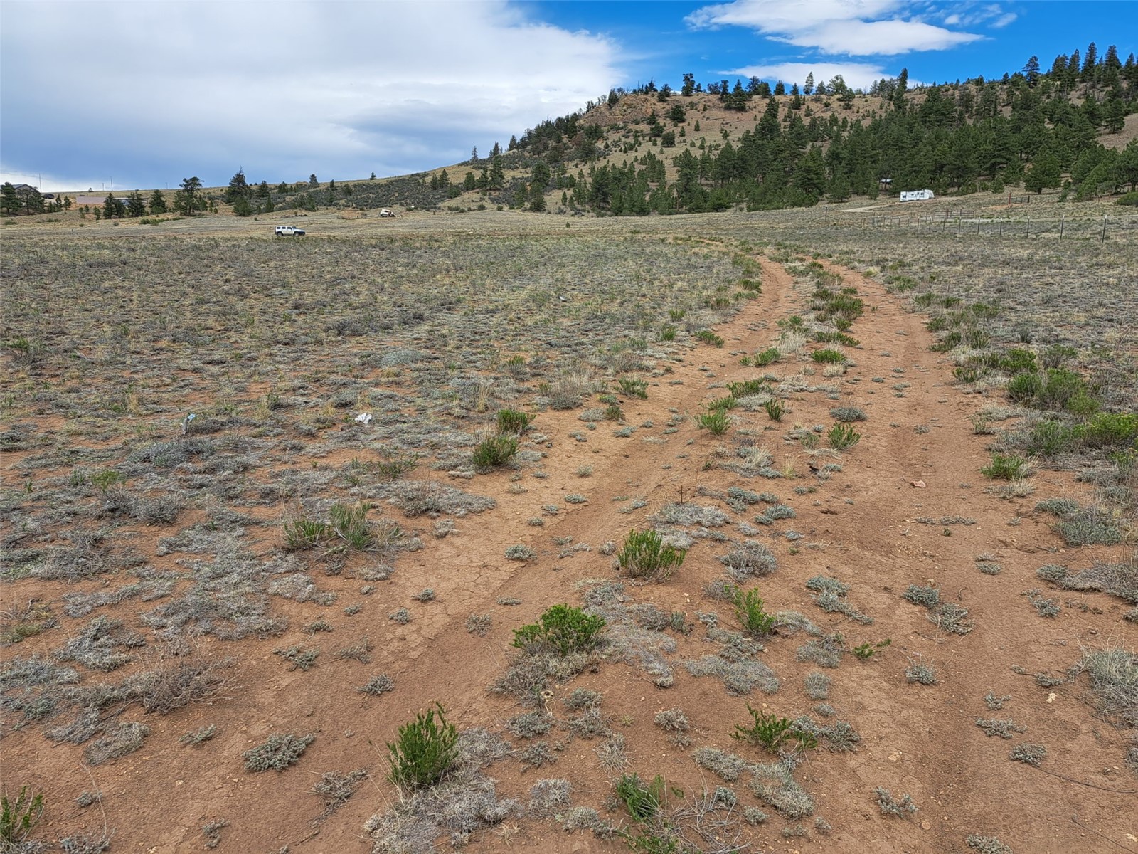 0 Cohonina Road Hartsel, CO 80449 - Photo 2 of 20 a view of a lake with beach and city view