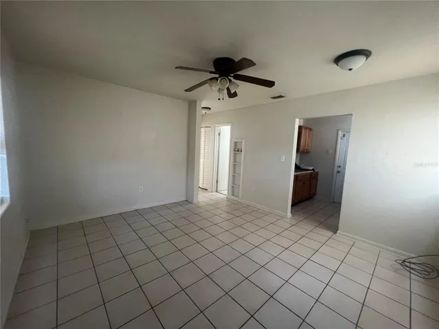 a view of an empty room and window