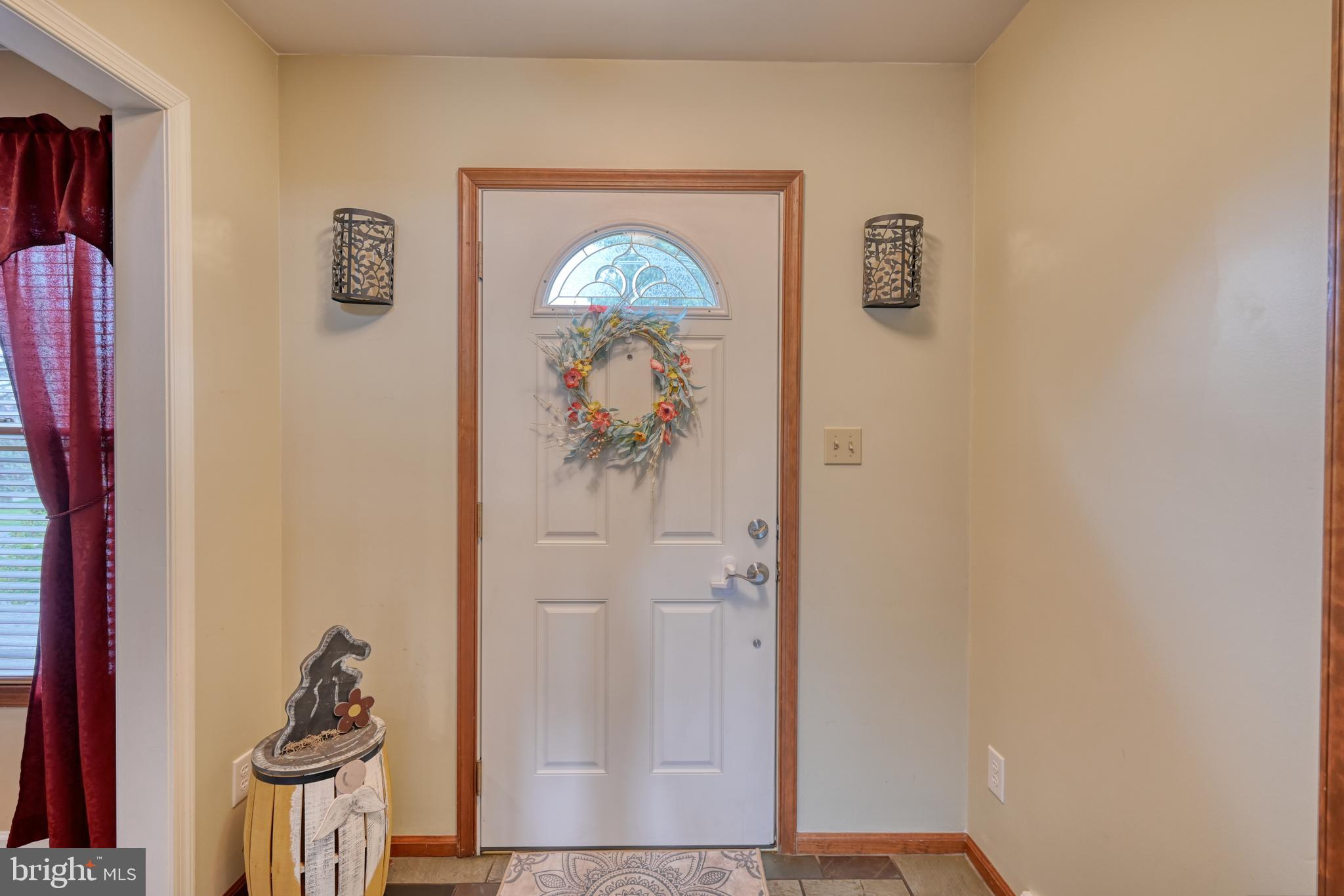 3320 Rothsville Road Akron, PA 17501 - Photo 2 of 41 a hallway with painting and a table