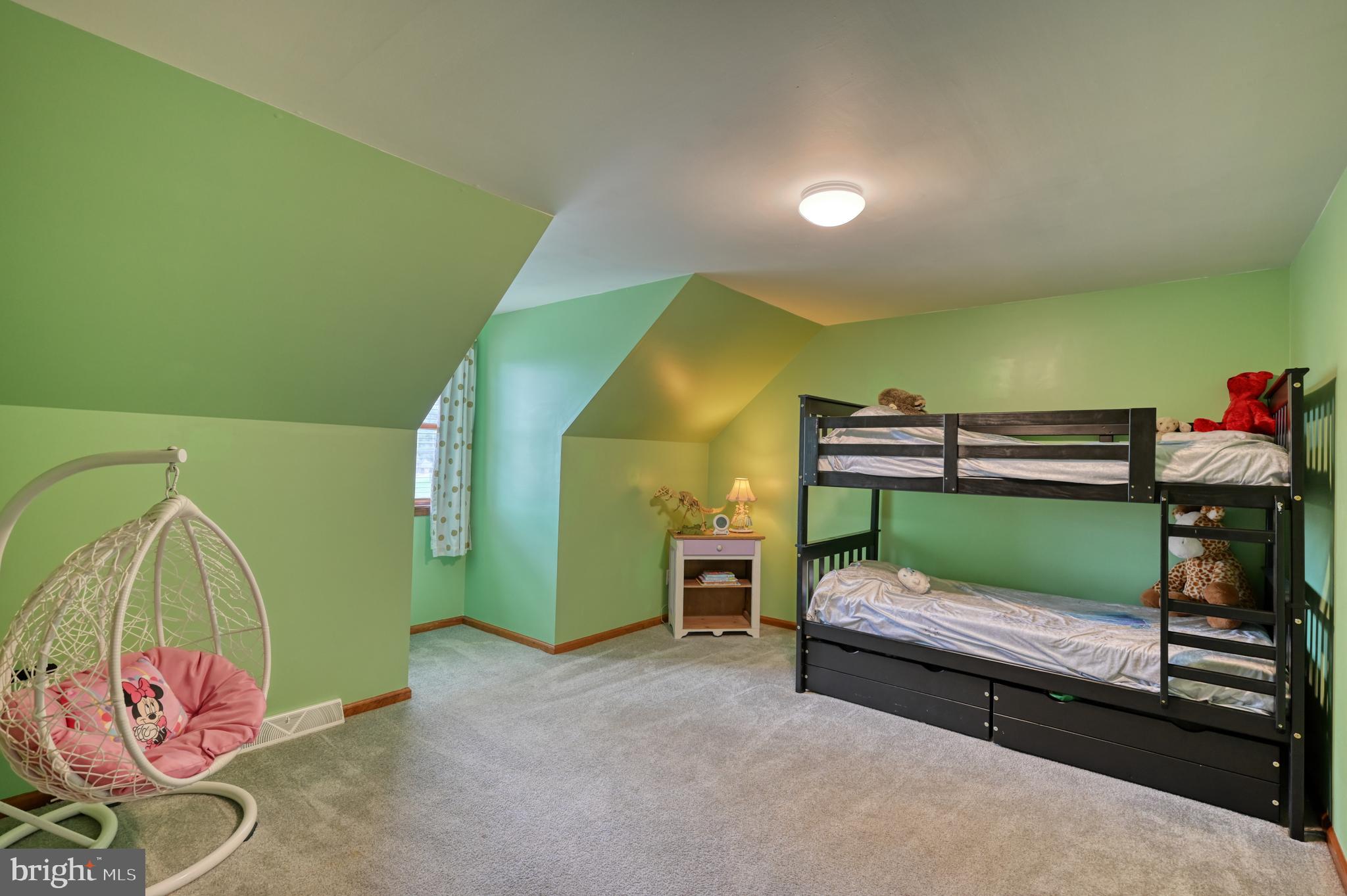 3320 Rothsville Road Akron, PA 17501 - Photo 23 of 41 a bedroom with a bed and a painting on the wall