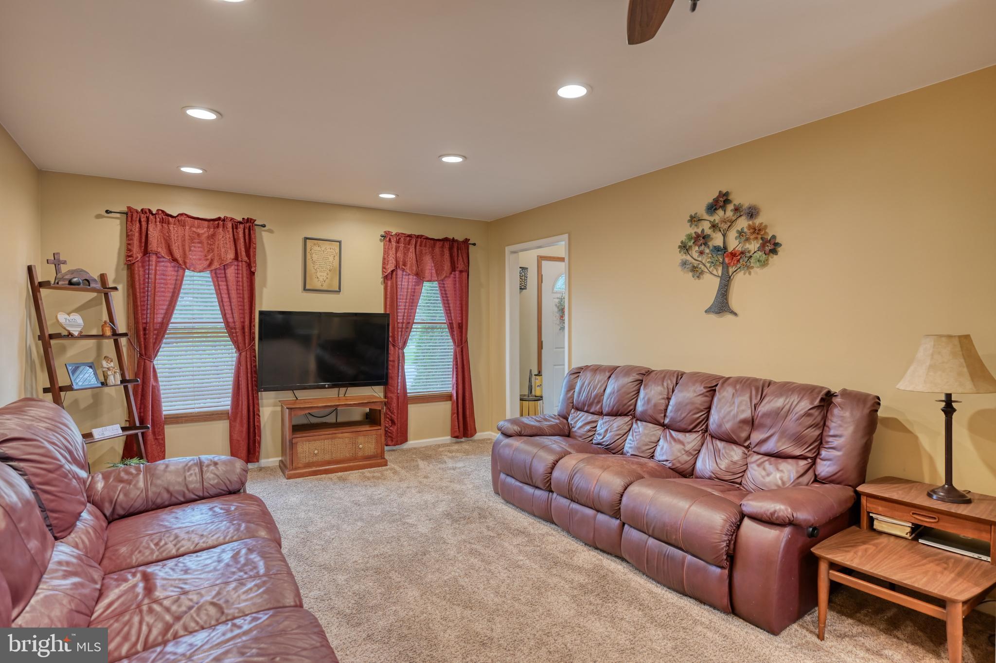 3320 Rothsville Road Akron, PA 17501 - Photo 4 of 41 a living room with furniture and a flat screen tv