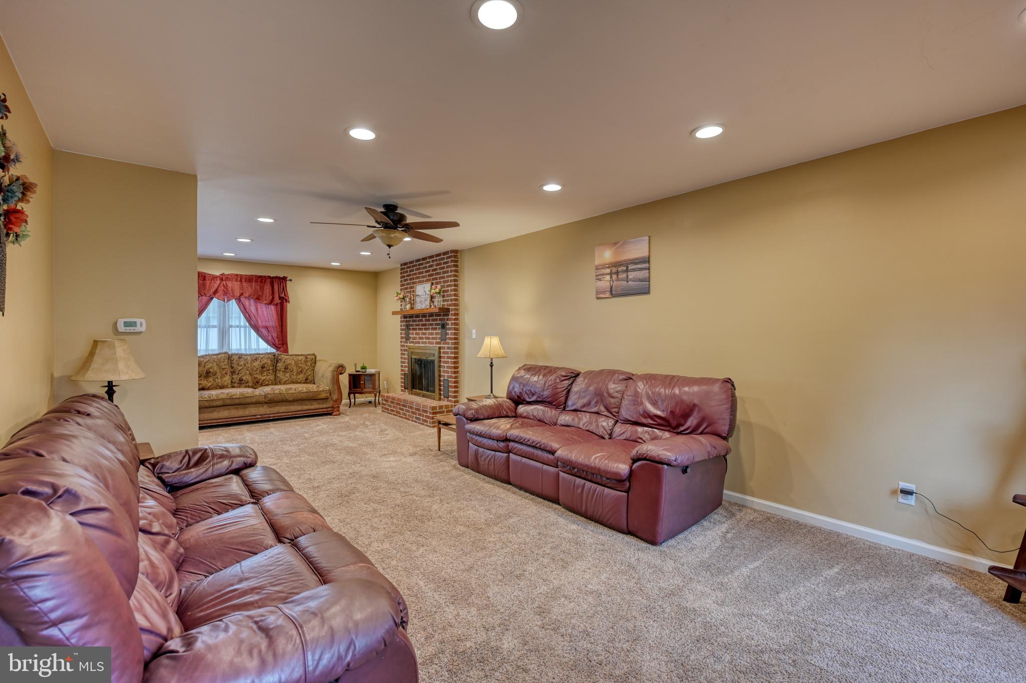 3320 Rothsville Road Akron, PA 17501 - Photo 6 of 41 a living room with furniture and a flat screen tv