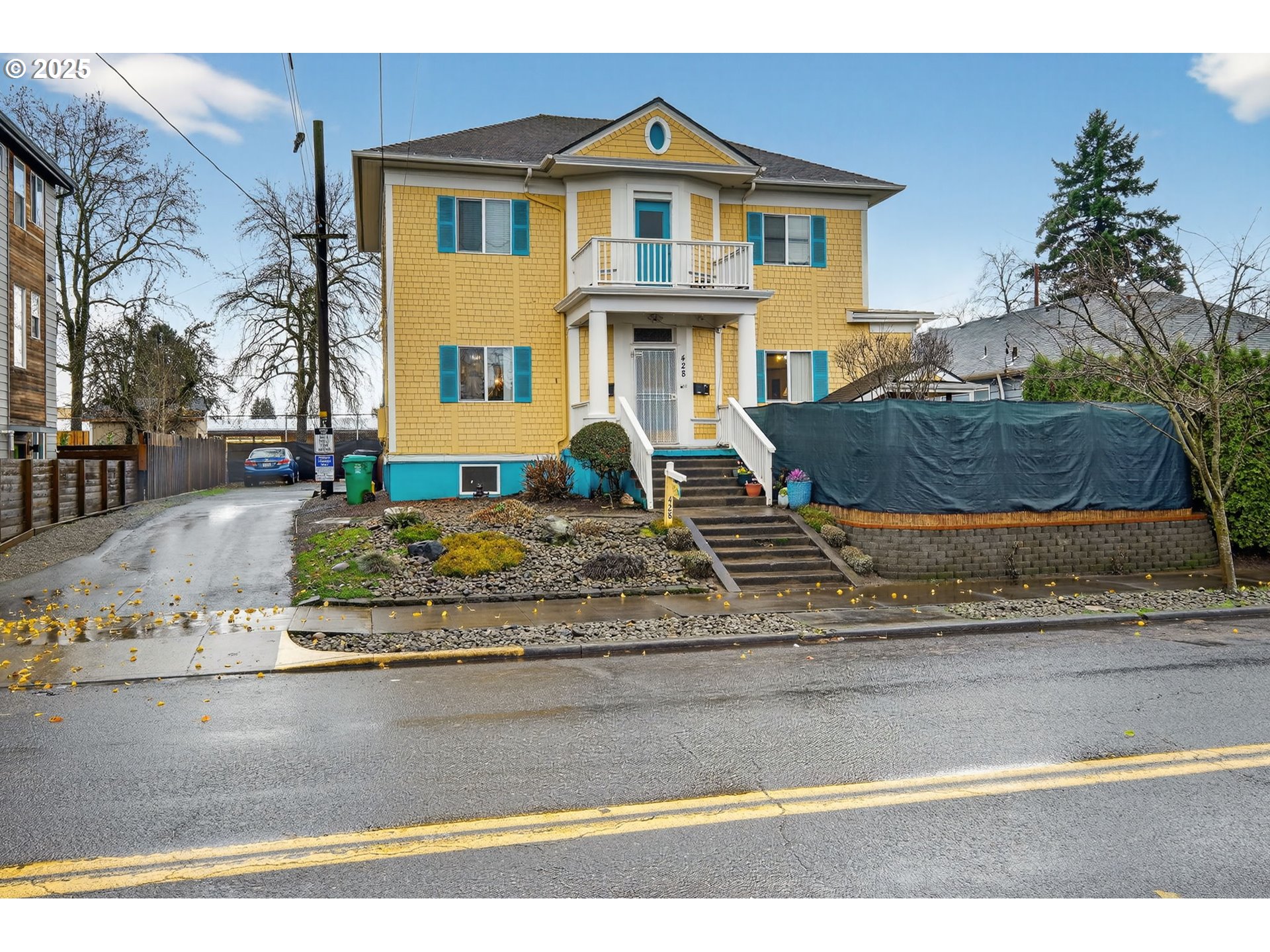 a front view of a house with a yard
