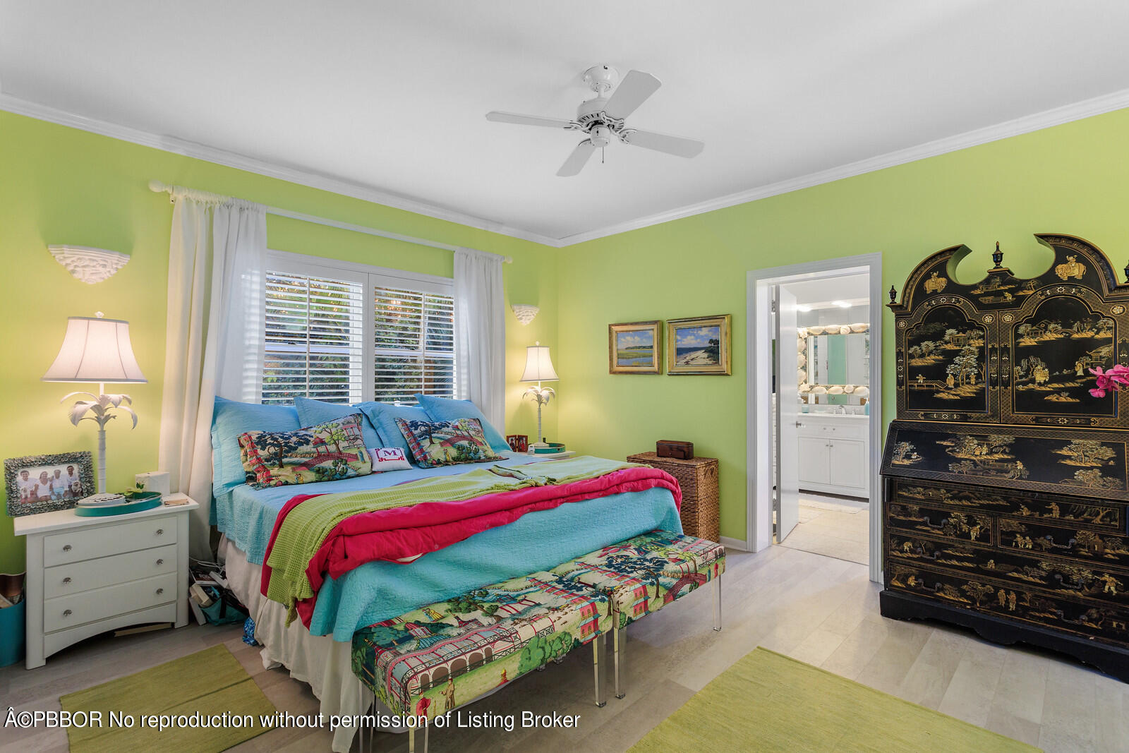 232 Mockingbird Trail Palm Beach, FL 33480 - Photo 7 of 14 a bedroom with a bed and a window