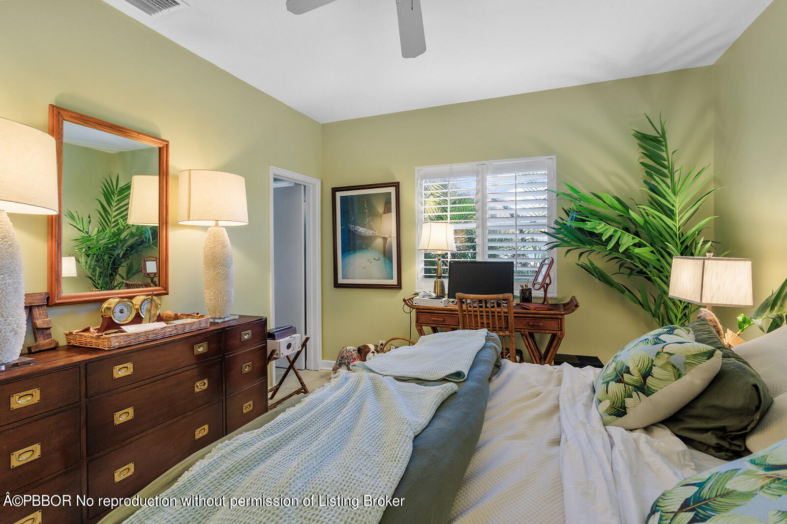 232 Mockingbird Trail Palm Beach, FL 33480 - Photo 8 of 14 a living room with furniture and a flat screen tv
