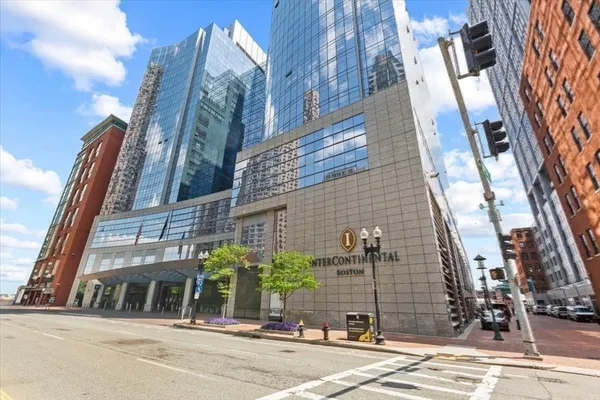 a view of a building with a street