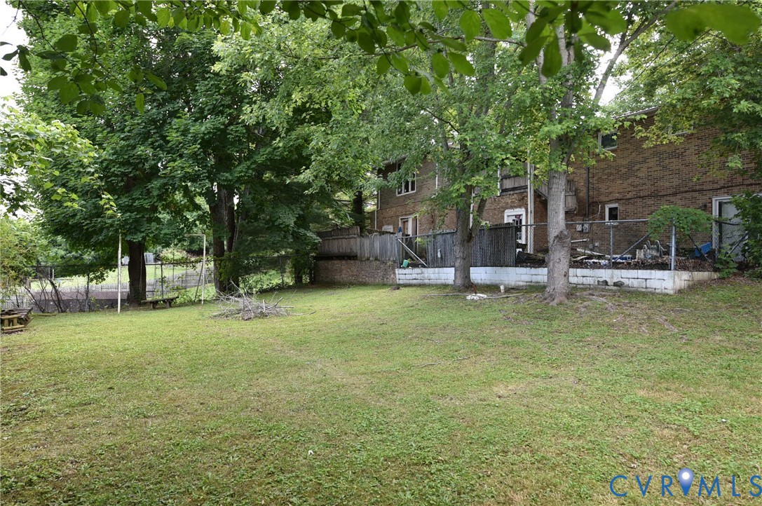 642 Star Street Pounding Mill, VA 24637 - Photo 19 of 20 Expansive rear lawn framed by mature deciduous tre