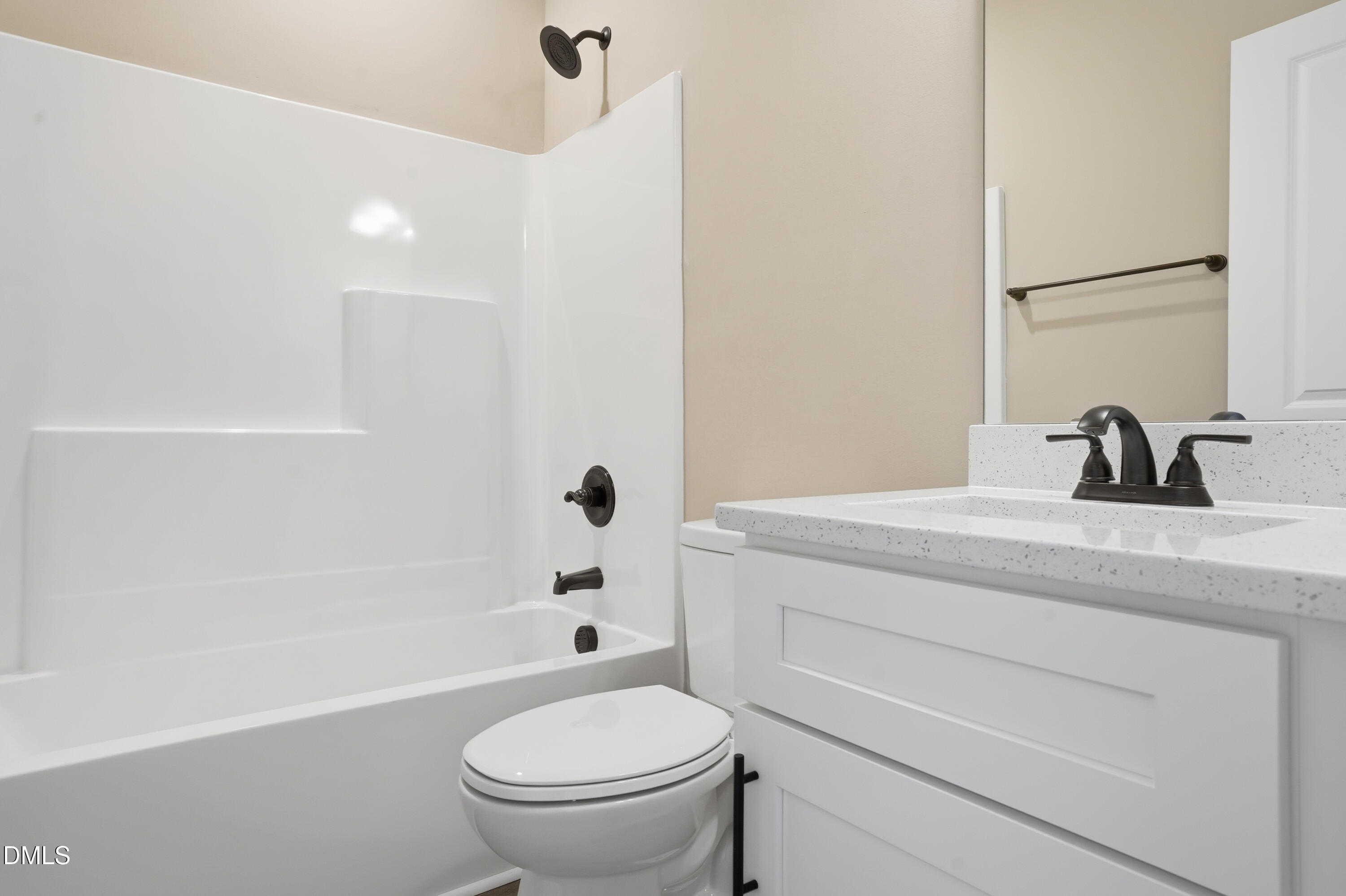 1115 Jada Allen Road Dunn, NC 28334 - Photo 18 of 32 a bathroom with a sink a toilet and a bathtub