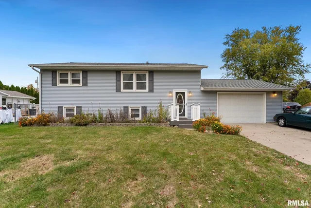 a house view with a backyard space