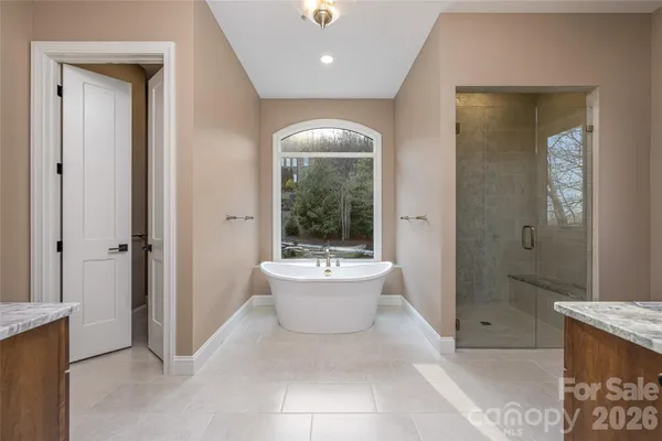 a bathroom with a bathtub sink and toilet