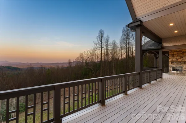 a view of balcony with furniture