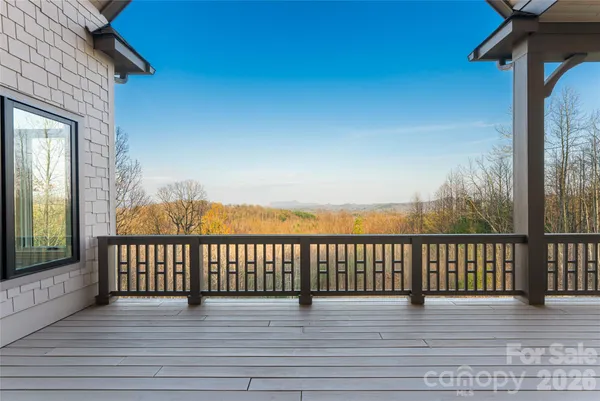 a view of wooden balcony with a floor