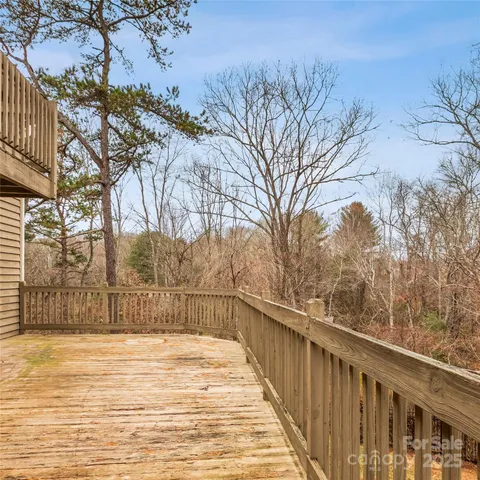 a balcony with view of trees