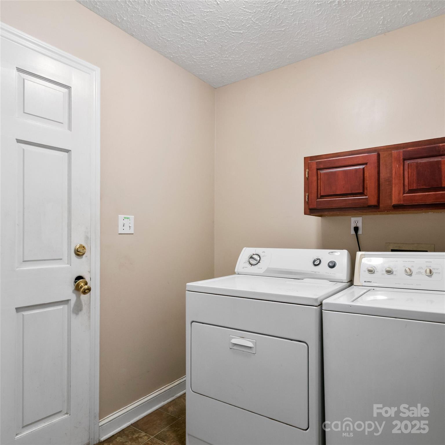 2 Sun Up Lane Candler, NC 28715 - Photo 20 of 30 a utility room with dryer and washer