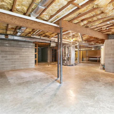 a view of a room with wooden walls