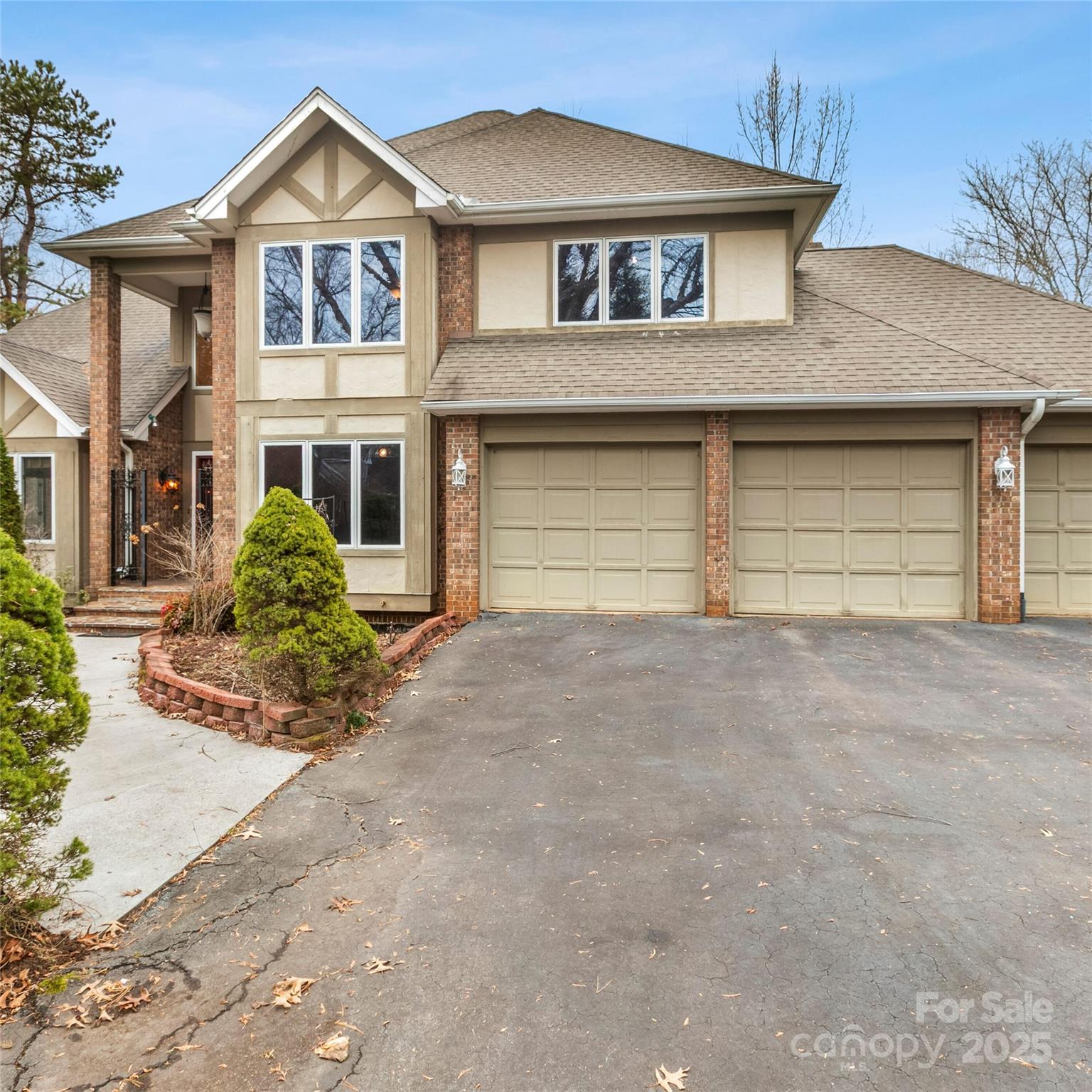 2 Sun Up Lane Candler, NC 28715 - Photo 3 of 30 a view of a white house with large windows