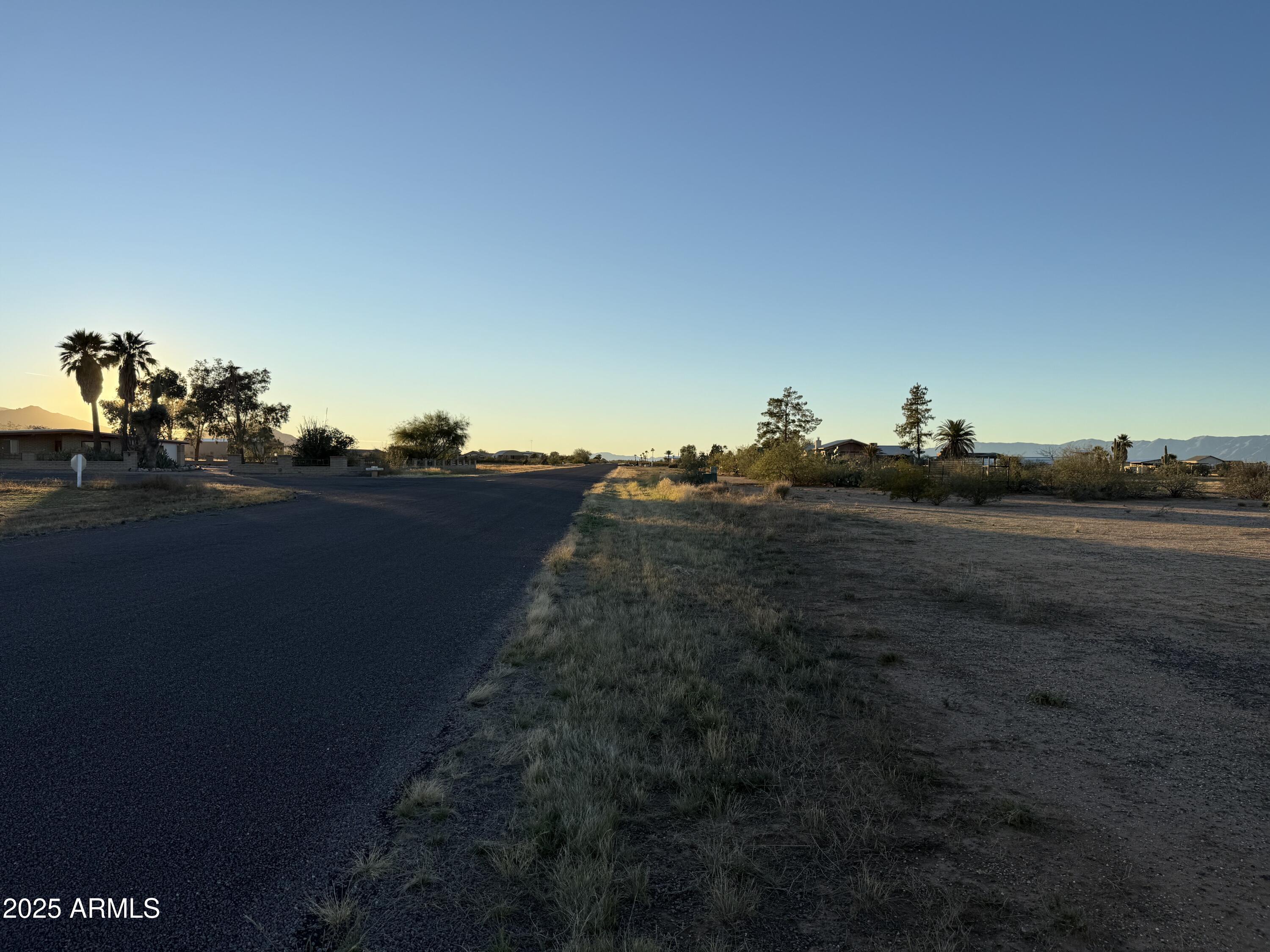 0 West Iver Road, Unit 43 & 35 Aguila, AZ 85320 - Photo 11 of 19 a view of a house with a street
