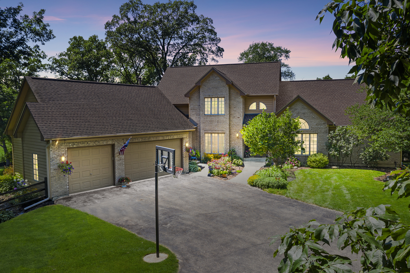 3S546 Finley Road Sugar Grove, IL 60554 - Photo 60 of 60 a front view of a house with a yard and garage