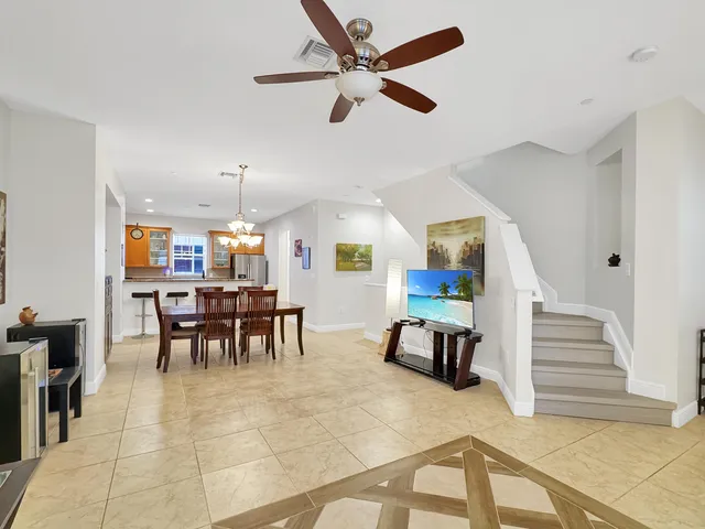 a view of dining room with furniture and entryway