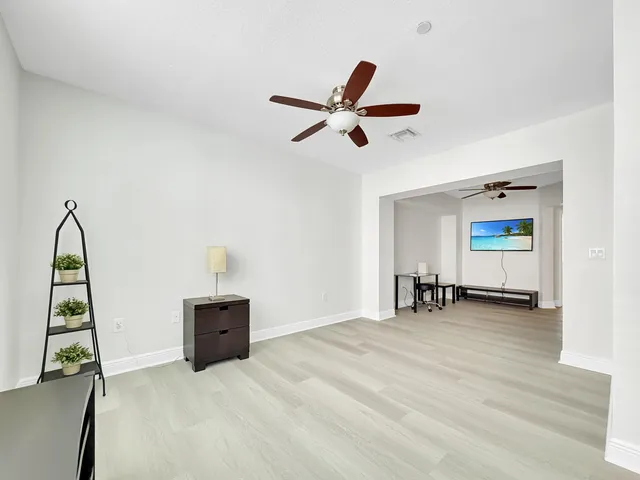 a view of a livingroom with a flat screen tv