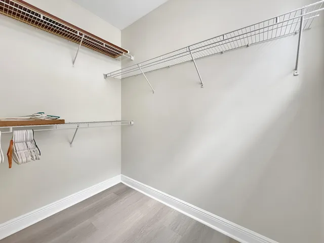 a view of a room with racks on the wall
