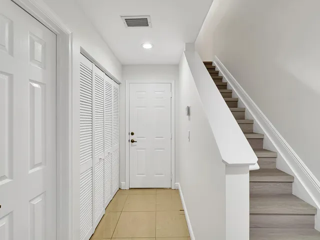 a view of a hallway with entryway