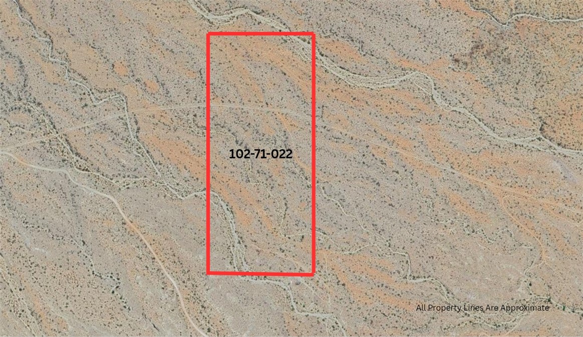 Parcel Parcel 102-71-022 Wikieup, AZ 85360 - Photo 2 of 11 a sign that is on a brick wall