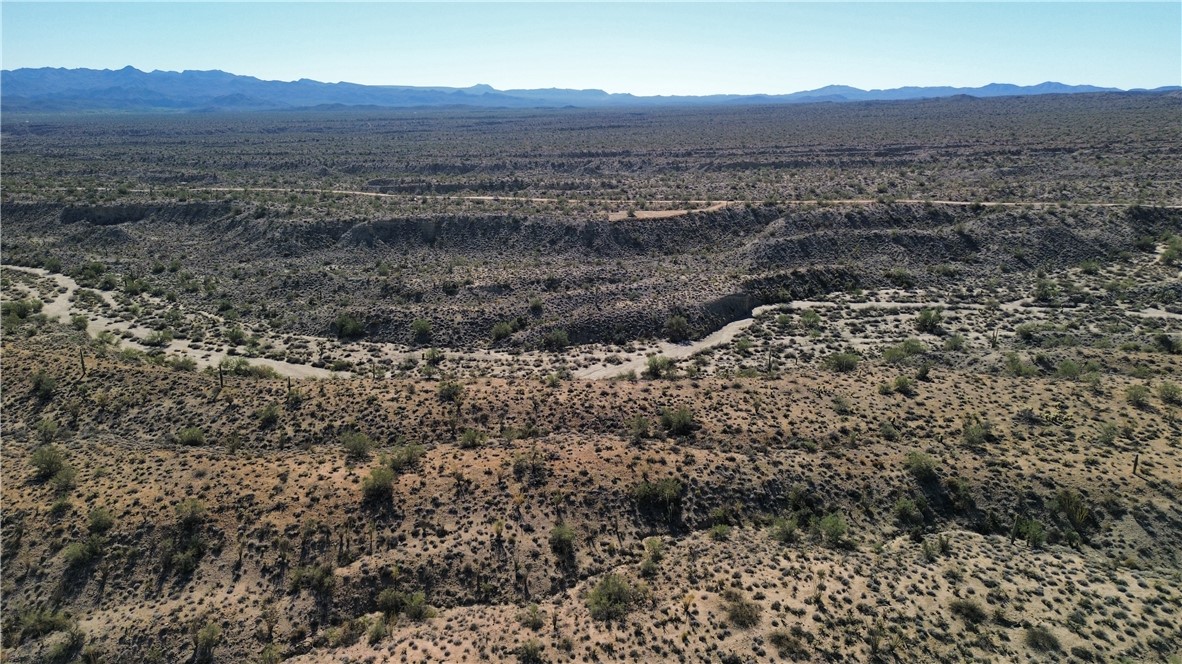 Parcel Parcel 102-71-022 Wikieup, AZ 85360 - Photo 8 of 11 a view of a mountain with a forest