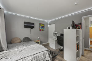 1052 Beaver Pond Road Williamstown, MA 01267 - Photo 17 of 37 a bedroom with a bed and a tv in it