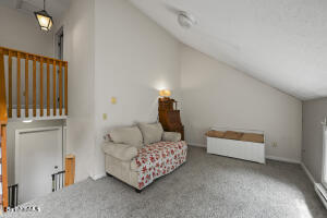 1052 Beaver Pond Road Williamstown, MA 01267 - Photo 20 of 37 a bedroom with a bed and a window