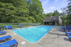 1052 Beaver Pond Road Williamstown, MA 01267 - Photo 29 of 37 a view of an house with swimming pool and deck