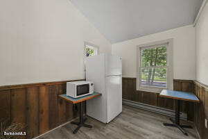 1052 Beaver Pond Road Williamstown, MA 01267 - Photo 33 of 37 a living room with furniture and a window