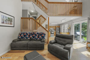 1052 Beaver Pond Road Williamstown, MA 01267 - Photo 6 of 37 a living room with furniture and a potted plant