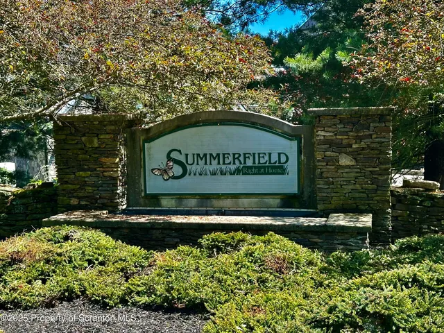 a sign on the side of a building