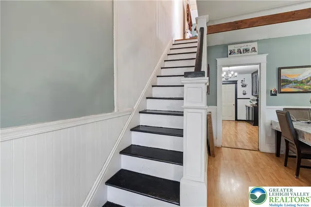 a view of hallway with stairs