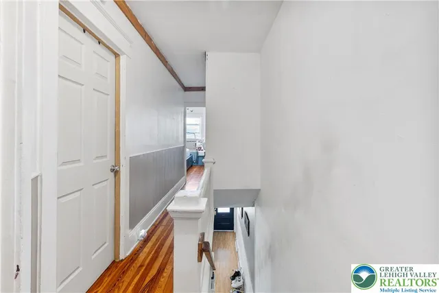 a bedroom with a bed and cabinets