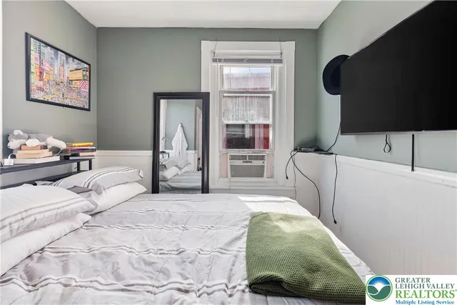 a bathroom with a sink and a shower curtain
