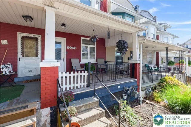 a view of a building with sitting area