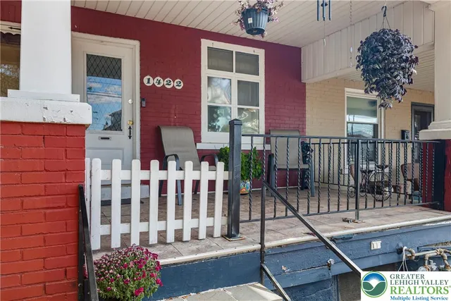 a view of a building with a porch