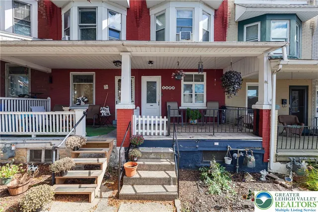 a view of a door and chair in the balcony