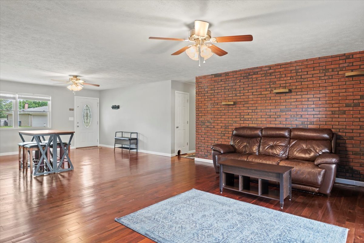 15 Mesa Road Springfield, IL 62702 - Photo 11 of 42 a living room with furniture and a fireplace