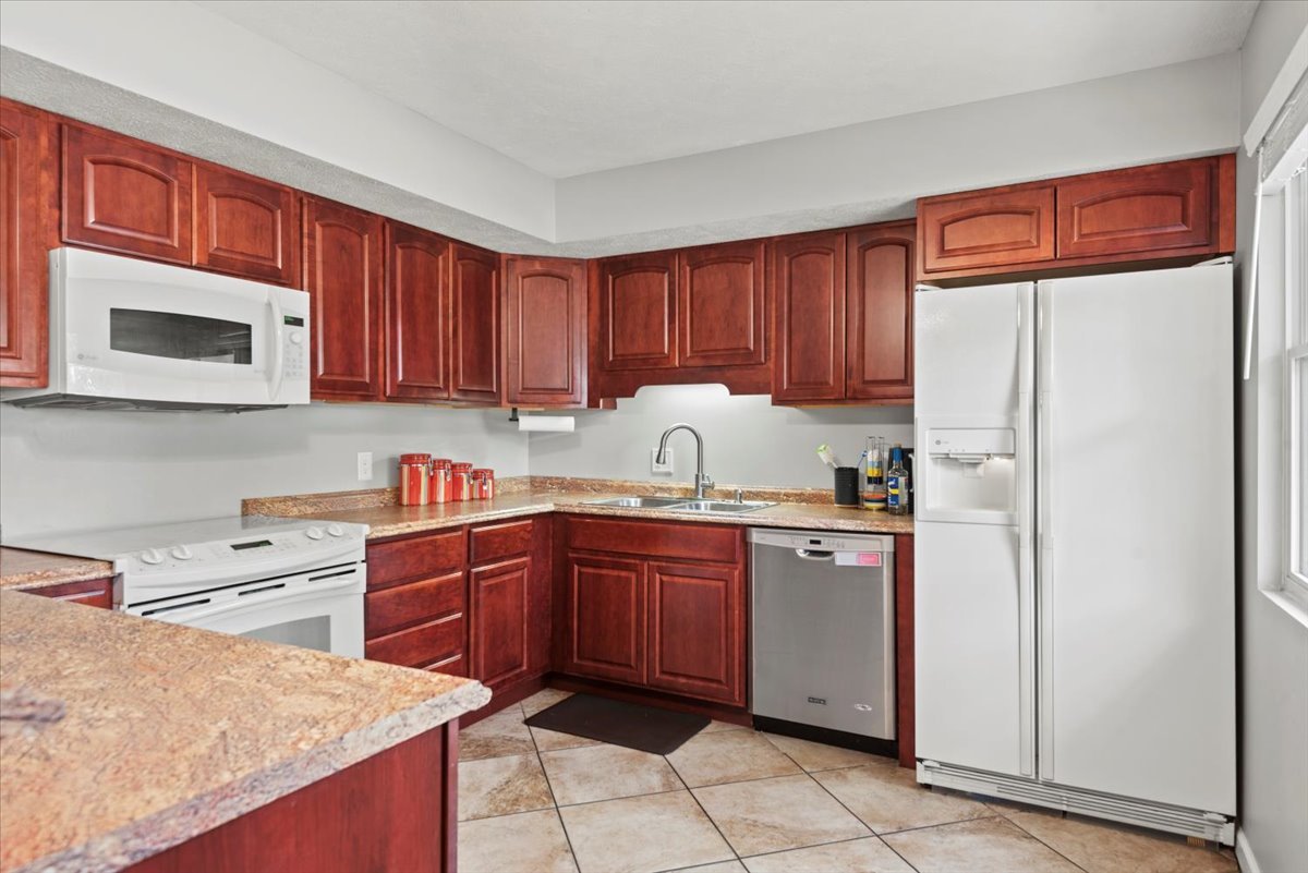 15 Mesa Road Springfield, IL 62702 - Photo 13 of 42 a kitchen with stainless steel appliances granite countertop a refrigerator sink and cabinets